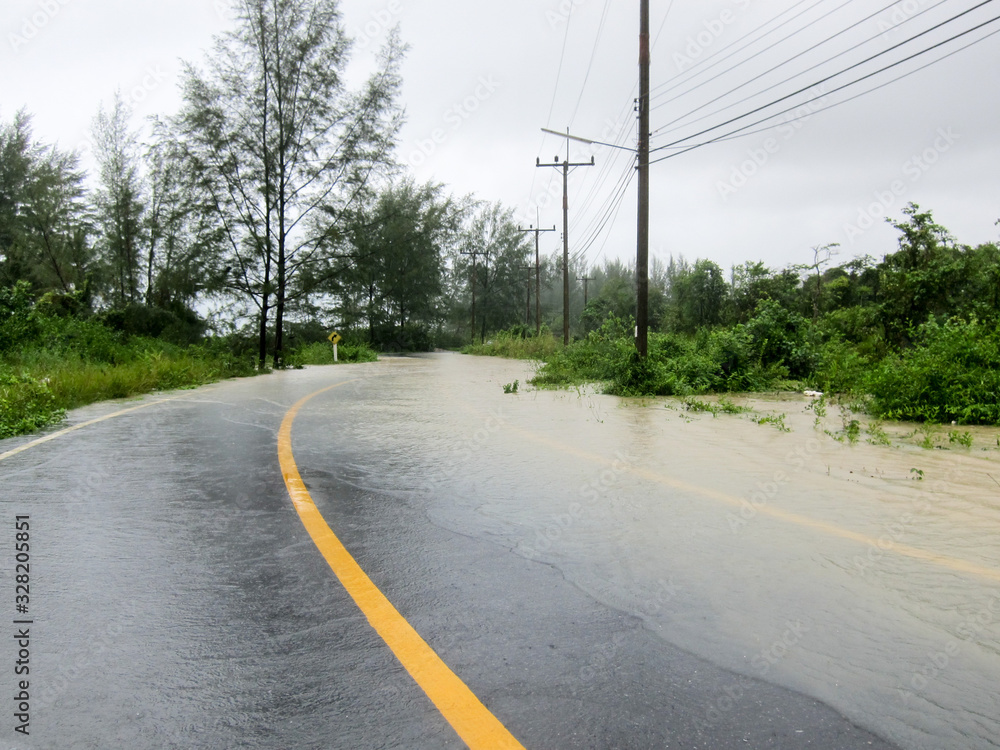 Flooded road during the monsoon season in Phang Nga, Thailand
