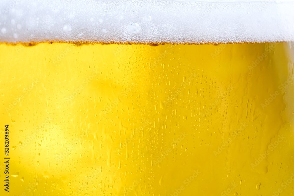 Background Cool beers with beer bubbles on top a glass at the party Background Cool beers with beer bubbles on top a glass at the party