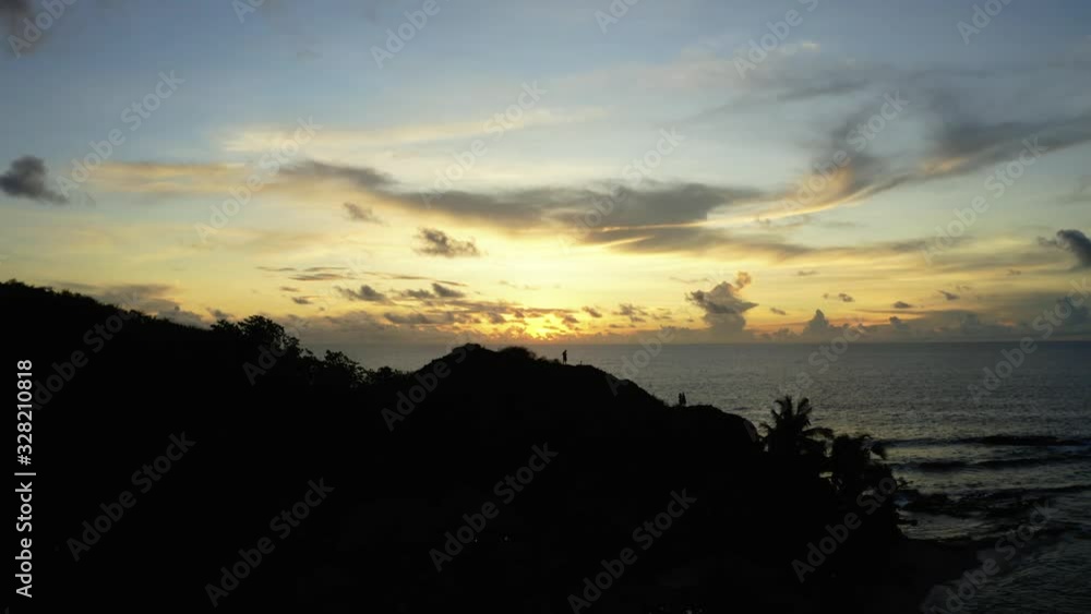 The beautiful view of the bright fiery sunset from the Fiji mountain islands - aerial The beautiful view of the bright fiery sunset from the Fiji mountain islands - aerial