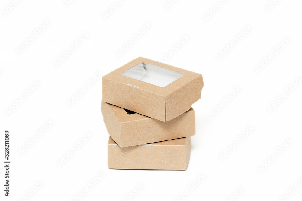 Eco kraft paper tableware. Fast food paper containers isolated on white background. Recycling concept. Zero waste. Eco kraft paper tableware. Fast food paper containers isolated on white background. Recycling concept. Zero waste.