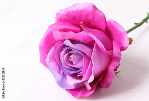 purple colorful textile rose closeup