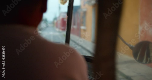 POV Passenger in Tuk-Tuk driving through bumpy Antigua Guatemala Streets