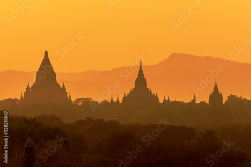 Scenic and stunning sunrise at Archaeological Zone over Bagan in Myanmar. Bagan is an ancient city and World Heritage Site certified by UNESCO with thousands of historic buddhist temples