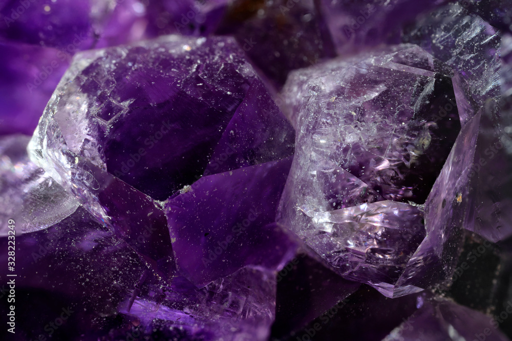 Amethyst crystals in macro view. Amethyst crystals in macro view.