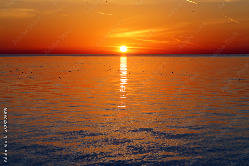 Beautiful photo of a bright sunset sea