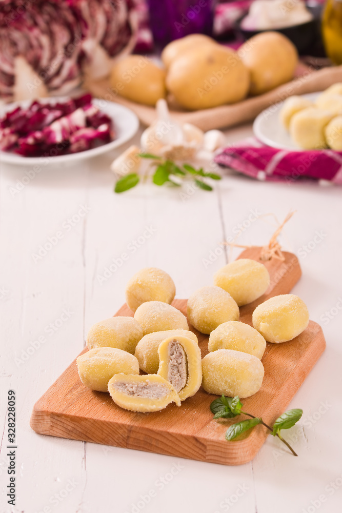 Potato gnocchi stuffed with radicchio and ricotta. Potato gnocchi stuffed with radicchio and ricotta.