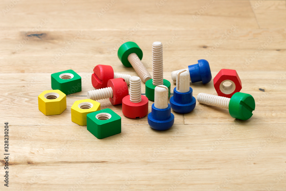 wooden toy tools on hardwood floor wooden toy tools on hardwood floor