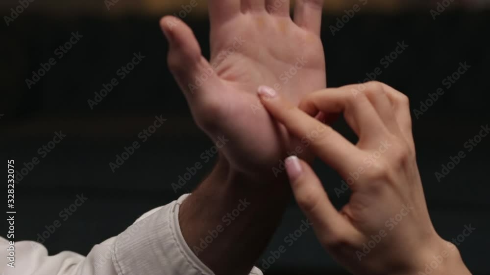 The touch of the hands of a loving couple close-up. The touch of the hands of a loving couple close-up.