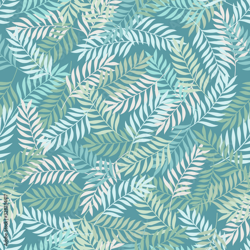 Leaves seamless pattern on blue background.