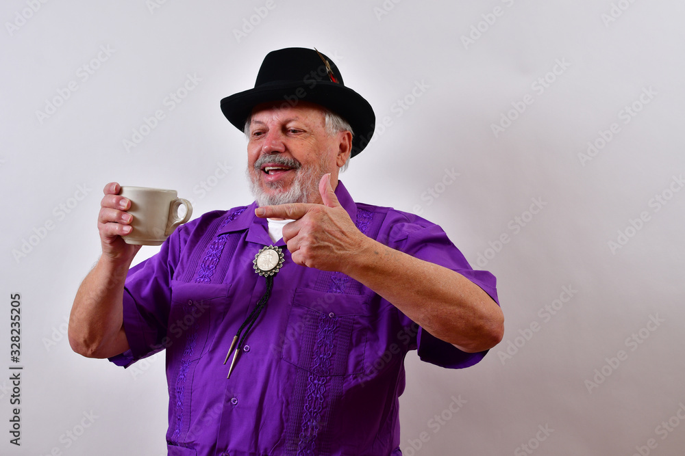Elderly gentleman enjoying a cup of coffee. Elderly gentleman enjoying a cup of coffee.