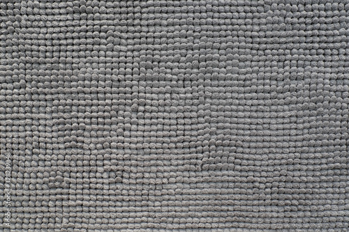 gray polyester doormat for texture, backdrop, wallpaper or background