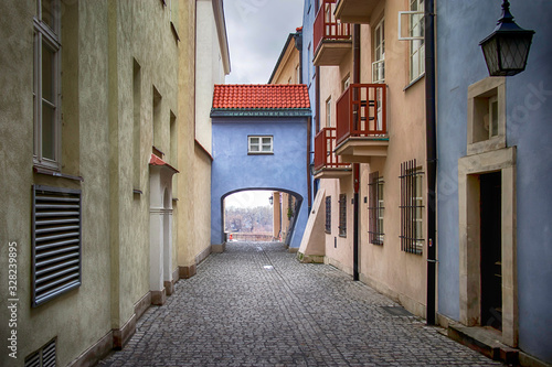 Arch passage on the narrow street in the center of the city