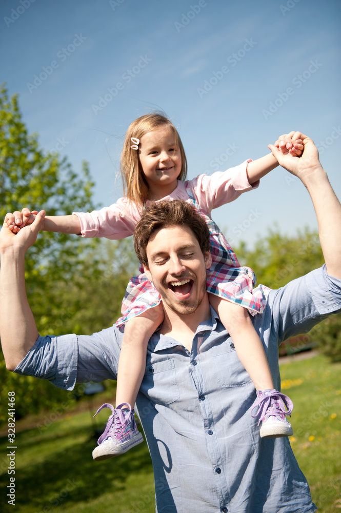 Happy family. Father with child in a park. Happy family. Father with child in a park.