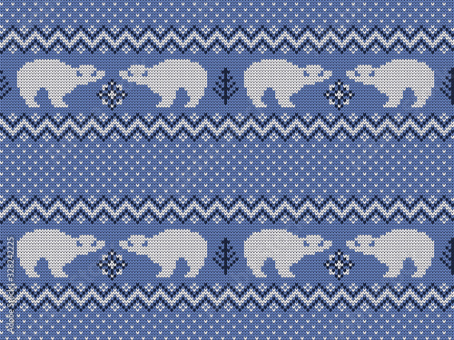 Knitted vector northern seamless decorative pattern with darling polar bear cubs.