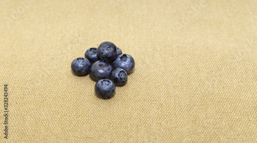 Northern highbush blueberries on beige linen