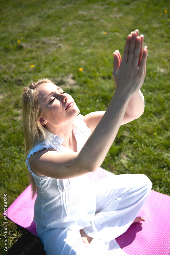 Happy young woman in a park Happy young woman in a park