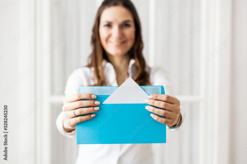 The girl holding the envelope, surprise, information, email, tax, gift The girl holding the envelope, surprise, information, email, tax, gift