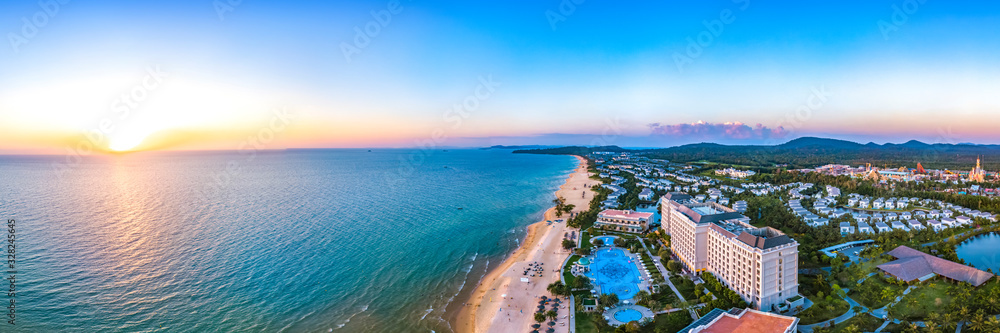 Coastal Resort Scenery of Phu Quoc Island During Sunset, Vietnam, a Tourism Destination for Summer Vacation in Southeast Asia, with Tropical Climate and Beautiful Landscape. Aerial View.