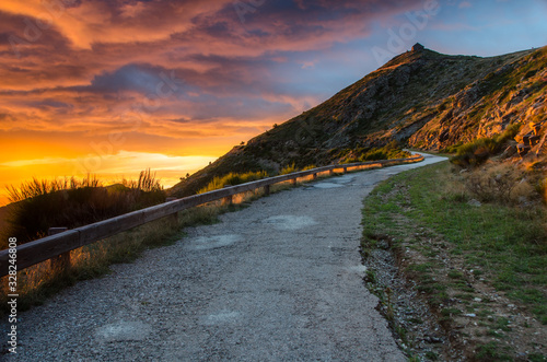 Puesta de sol en la carretera del parque natural del Montseny (Cataluña, España) photo