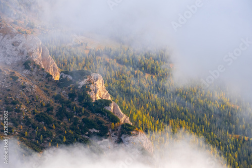 Lagazuoi Mountains above clouds around Averau and Pelmo Mountains, Belluno Province at Dolomites  Italian Alps photo