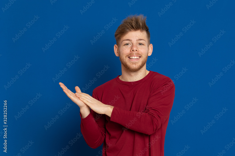 Attractive young guy with a red T-shirt Attractive young guy with a red T-shirt