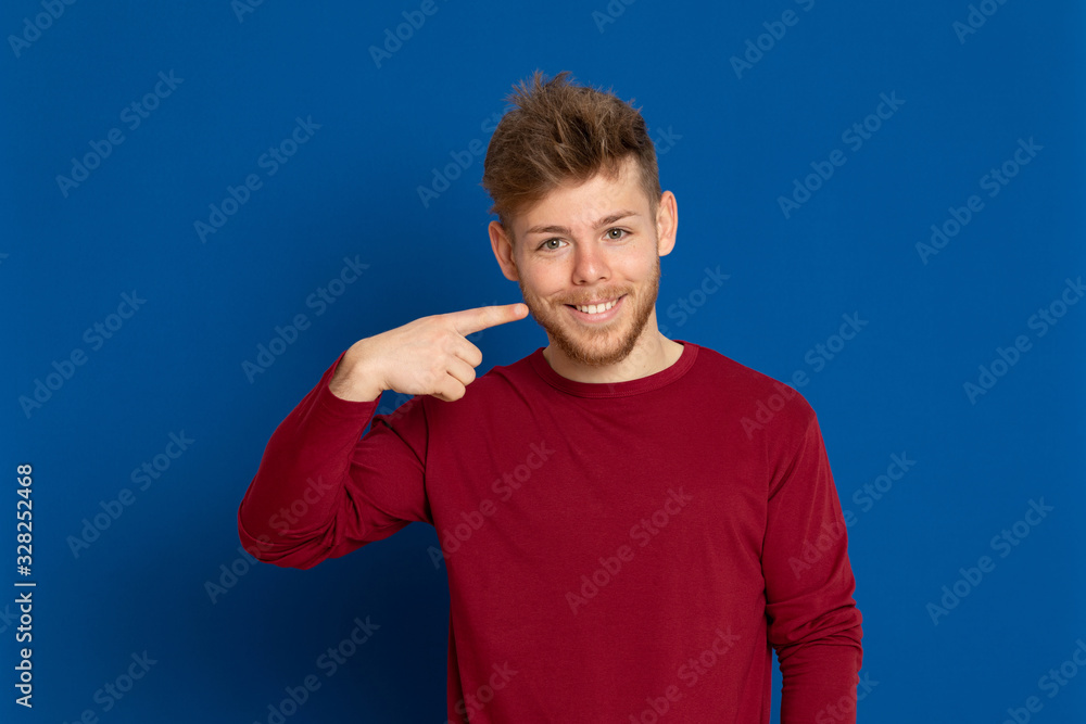 Attractive young guy with a red T-shirt Attractive young guy with a red T-shirt