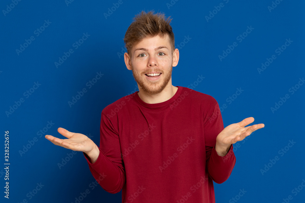 Attractive young guy with a red T-shirt Attractive young guy with a red T-shirt