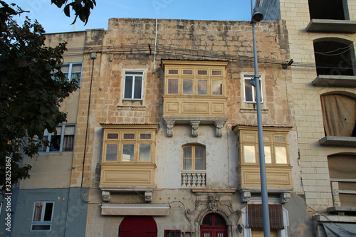 house or flat building in bormla (malta)  photo