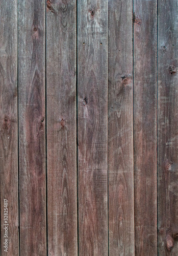 texture old wooden dark brown fence with scuffs