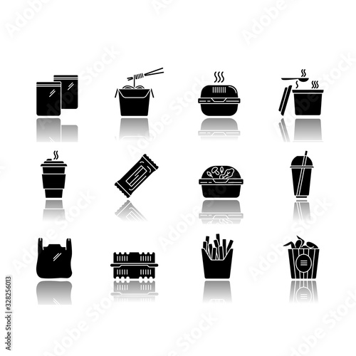 Takeaway food packages drop shadow black glyph icons set. Take out meal containers, boxes for delivery. Noodles, bucket of chicken wings, french fries. Isolated vector illustrations on white space