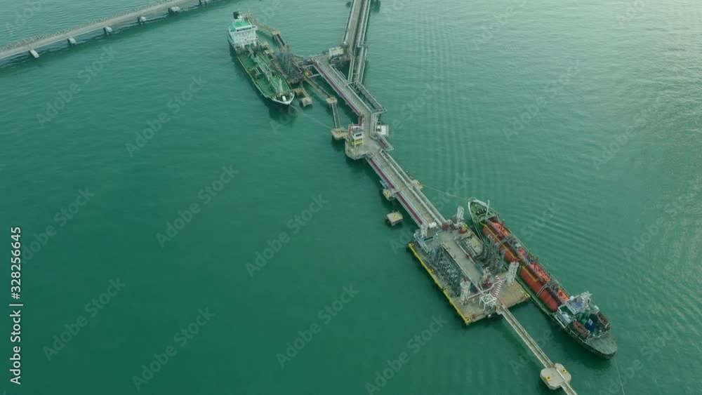 Aerial view oil tanker of business logistic sea going ship, Crude oil tanker lpg ngv at industrial estate Thailand / Group Oil tanker ship to Port of Singapore - import export Aerial view oil tanker of business logistic sea going ship, Crude oil tanker lpg ngv at industrial estate Thailand / Group Oil tanker ship to Port of Singapore - import export