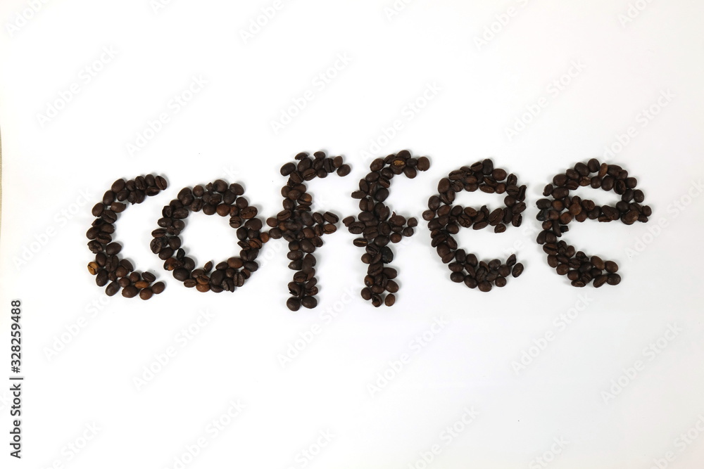 The coffee beans are arranged in alphabetical order and the coffee powder is on a white background. The coffee beans are arranged in alphabetical order and the coffee powder is on a white background.