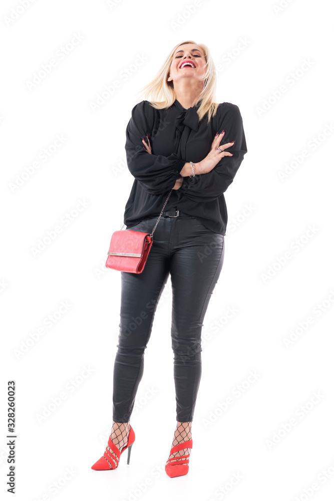 Happy stylish middle aged elegant woman laughing hard with head back and crossed hand. Full body length isolated on white background.
