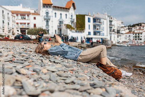Woman doing turism in Cadaques, Catalonia, Spain. photo