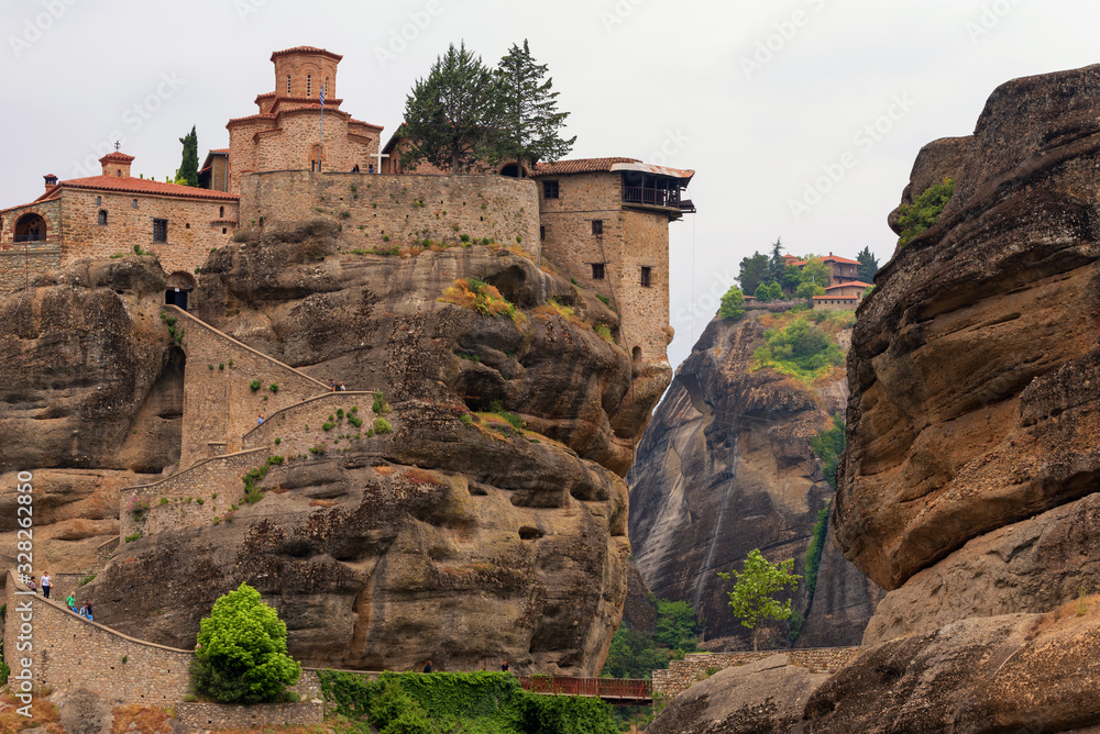 Great Meteoron Monastery. Beautiful scenic view, ancient traditional greek building on the top of huge stone pillar in Meteora, Eastern Orthodox Church, Pindos, Thessaly, Greece, Europe. Magnificent s
