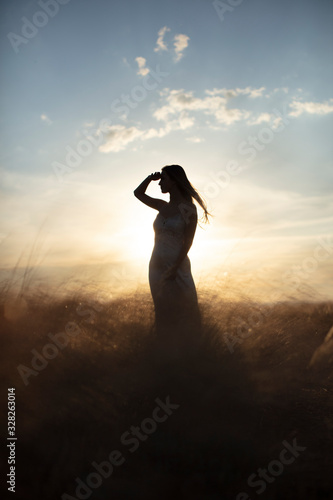 Woman enjoying the sunset