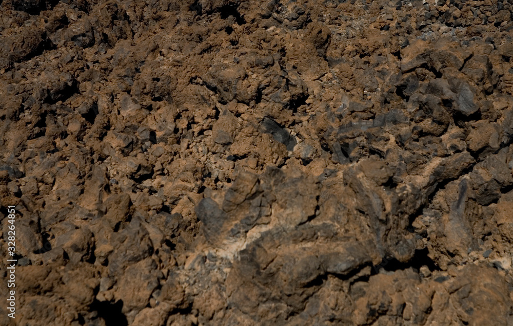 original brown natural background of volcanic congealed lava in close-up