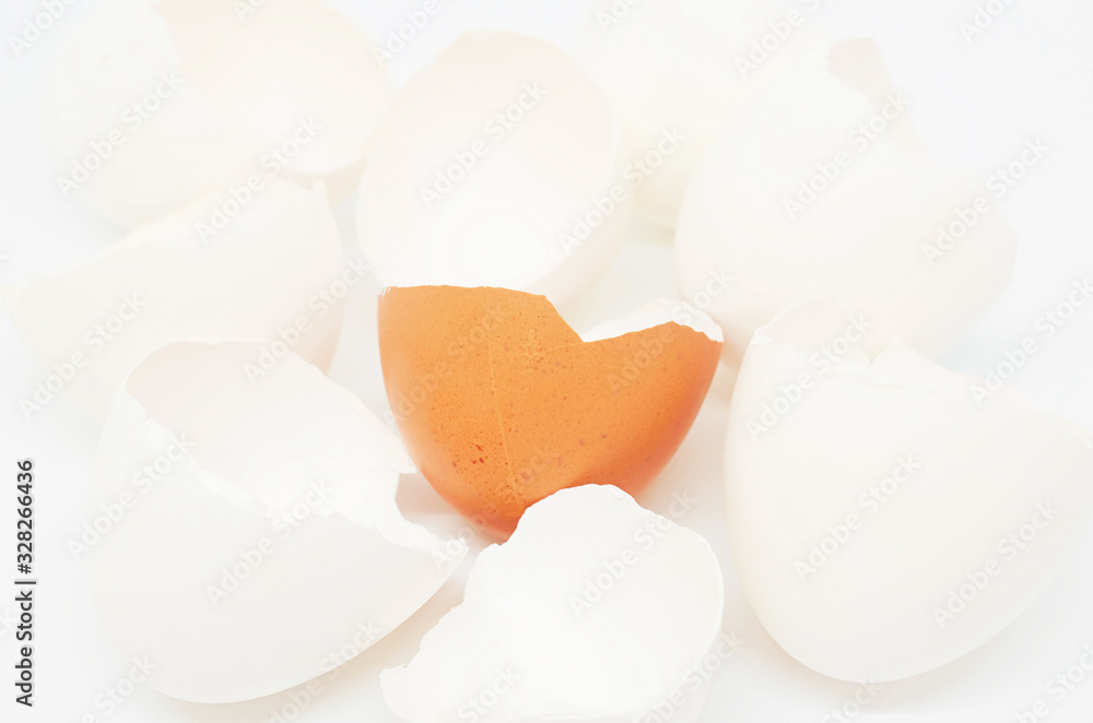 background of broken white and brown shell chicken eggs background of broken white and brown shell chicken eggs