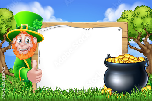 A St Patricks Day Leprechaun cartoon character peeking around a sign and giving a thumbs up. With a pot of gold in a woodland or park scene