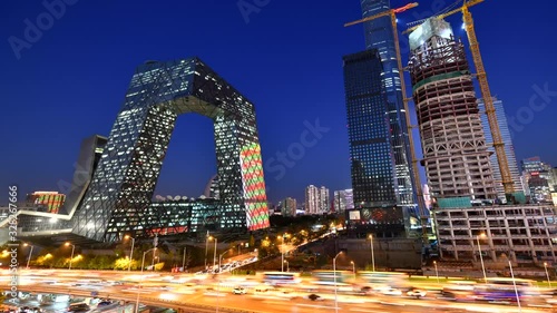 A famous landmark building China CCTV (CCTV) and China Zun Citic Tower at twilight time, Beijing, China  photo