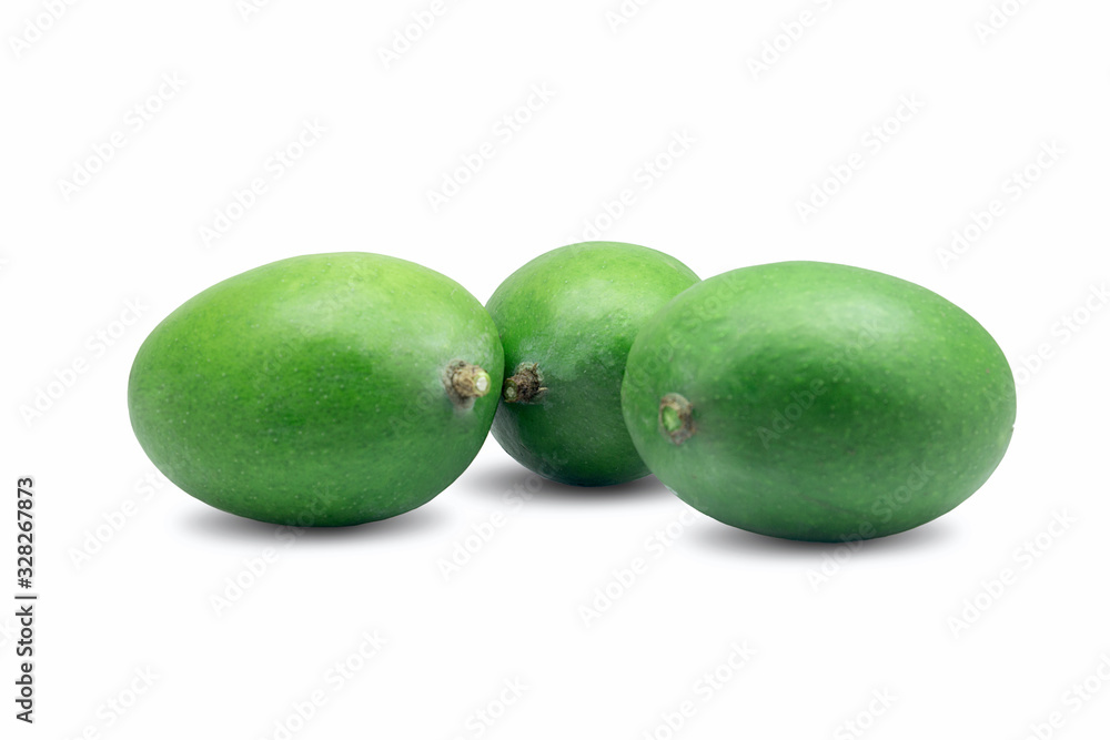 Obraz premium raw green mangoes on white background