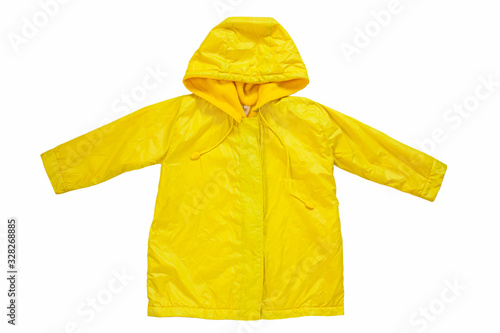 Yellow raincoat on white background isolated. Happy funny kids outwear autumn style clothes. Enjoying rainfall. Happy rainy day concept, Hello Fall greeting card copy space flat lay.Bright rain jacket