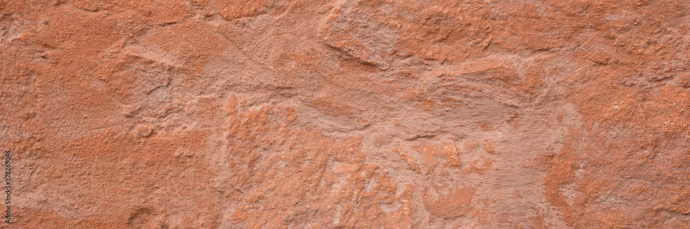 Panoramic texture of a plain wall painted with brown color. Panoramic brown background Panoramic texture of a plain wall painted with brown color. Panoramic brown background