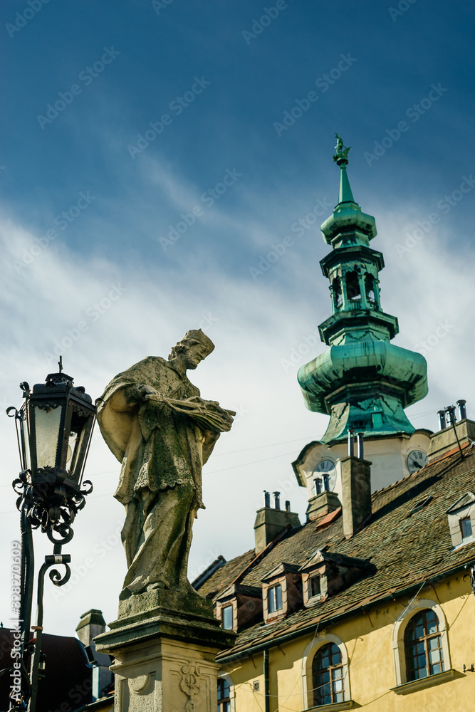 Ancient sculpture of Jan Nepomucky near Michal Gate in Bratislava, Slovakia Ancient sculpture of Jan Nepomucky near Michal Gate in Bratislava, Slovakia