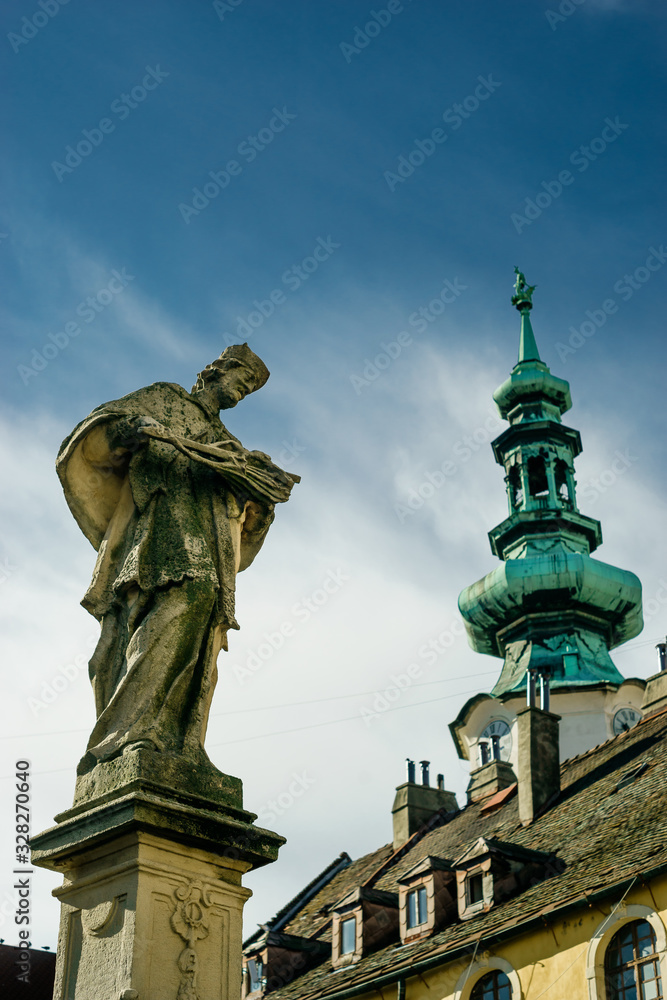 Ancient sculpture of Jan Nepomucky near Michal Gate in Bratislava, Slovakia Ancient sculpture of Jan Nepomucky near Michal Gate in Bratislava, Slovakia