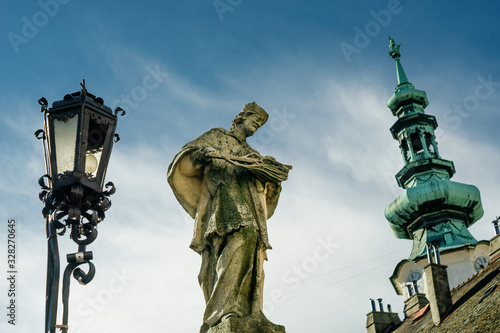 Canvas Print Ancient sculpture of Jan Nepomucky near Michal Gate in Bratislava, Slovakia