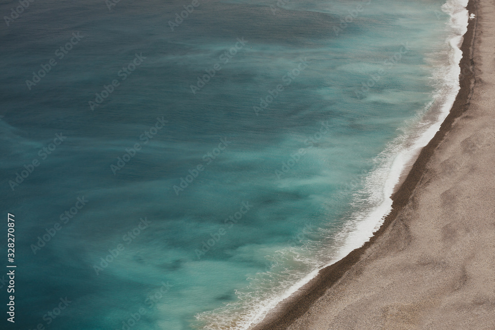 Sea scenic view with amazing azure water. The azure color of the water is beautifully bright. Beach with clear water from top view. Stunningly photo. Copy space. Sea scenic view with amazing azure water. The azure color of the water is beautifully bright. Beach with clear water from top view. Stunningly photo. Copy space.
