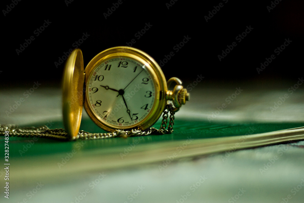 The view of the open golden pocket watch The view of the open golden pocket watch