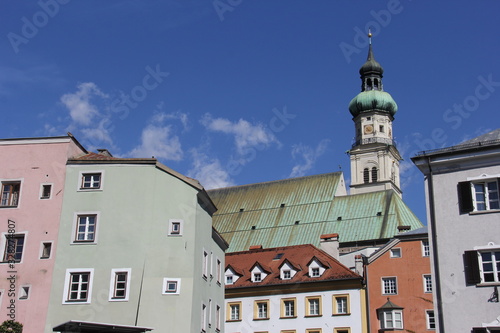 Urban European landscape with colored houses and church. Hall. Tirol. Austria