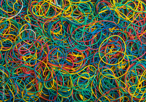 Abstract colored background of rubber rings of different colors